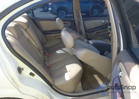 2001 Nissan Maxima Gle z USA, uszkodzony, nr VIN JN1CA31DX1T604610